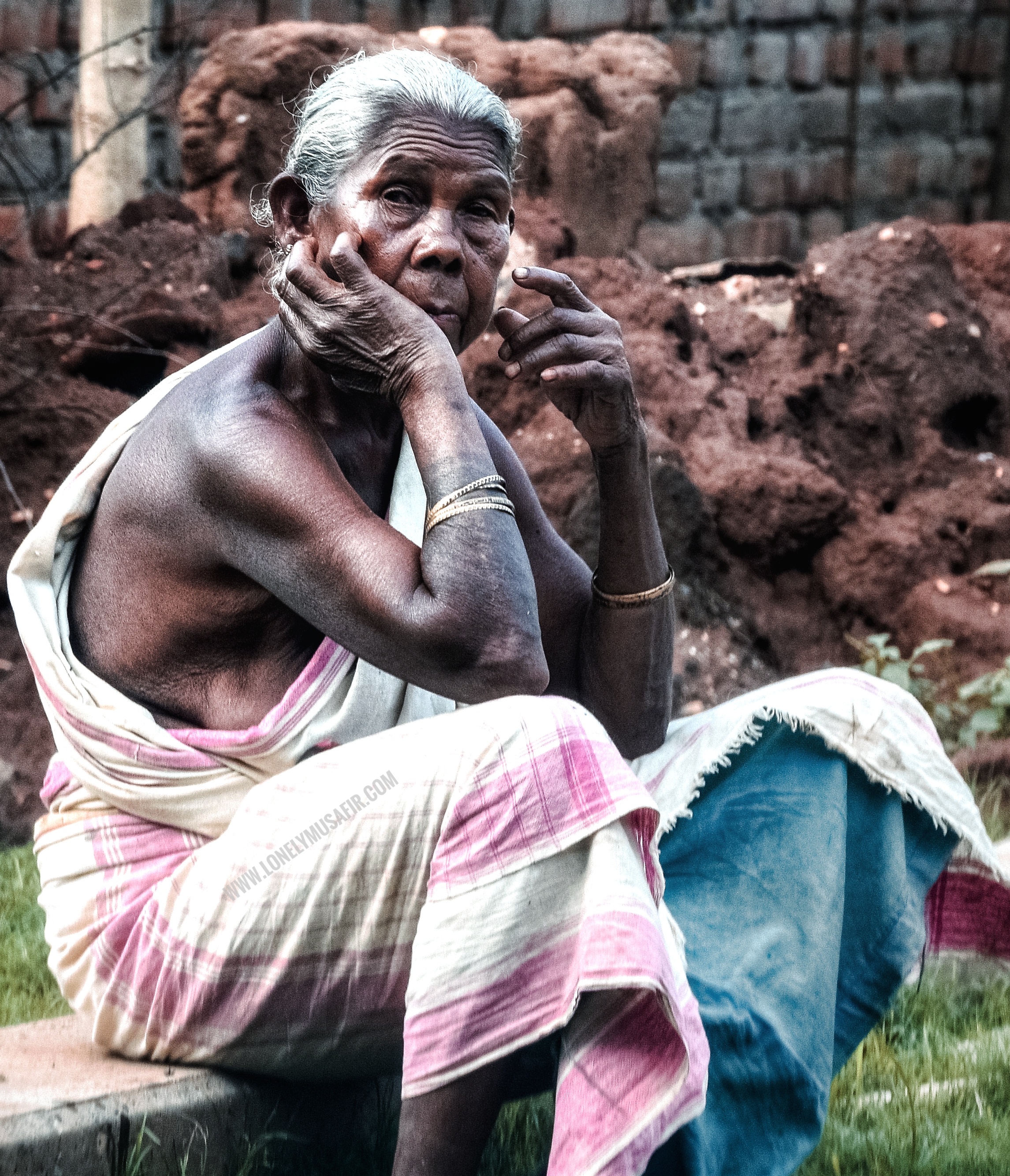Evening Indolence- An Old Lady from Santhal Tribe